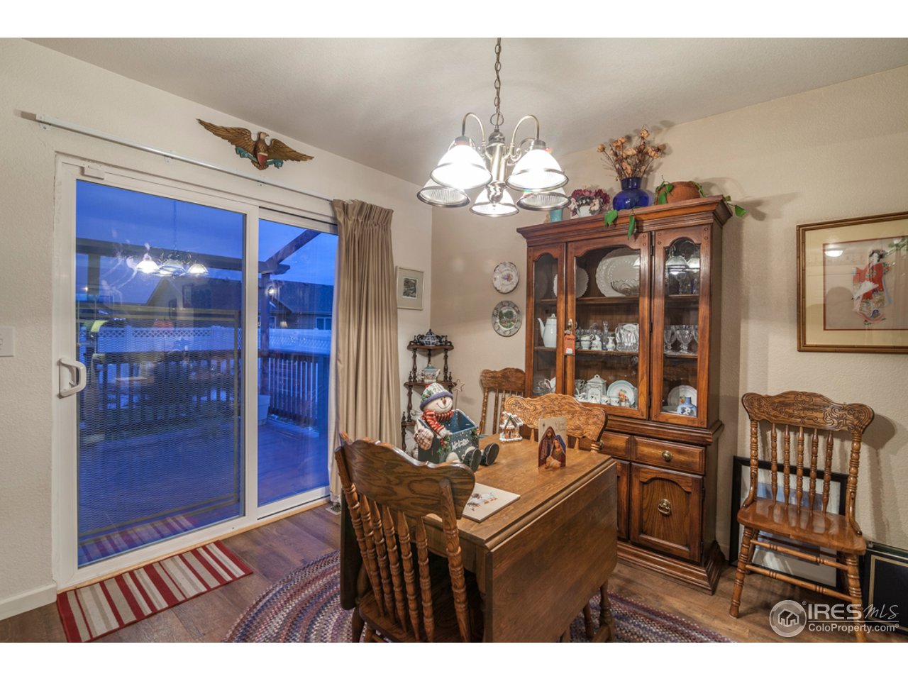 6948 McClellan Road Wellington, CO 80549 - Photo 6 of 36 dining room with wonderful deck space