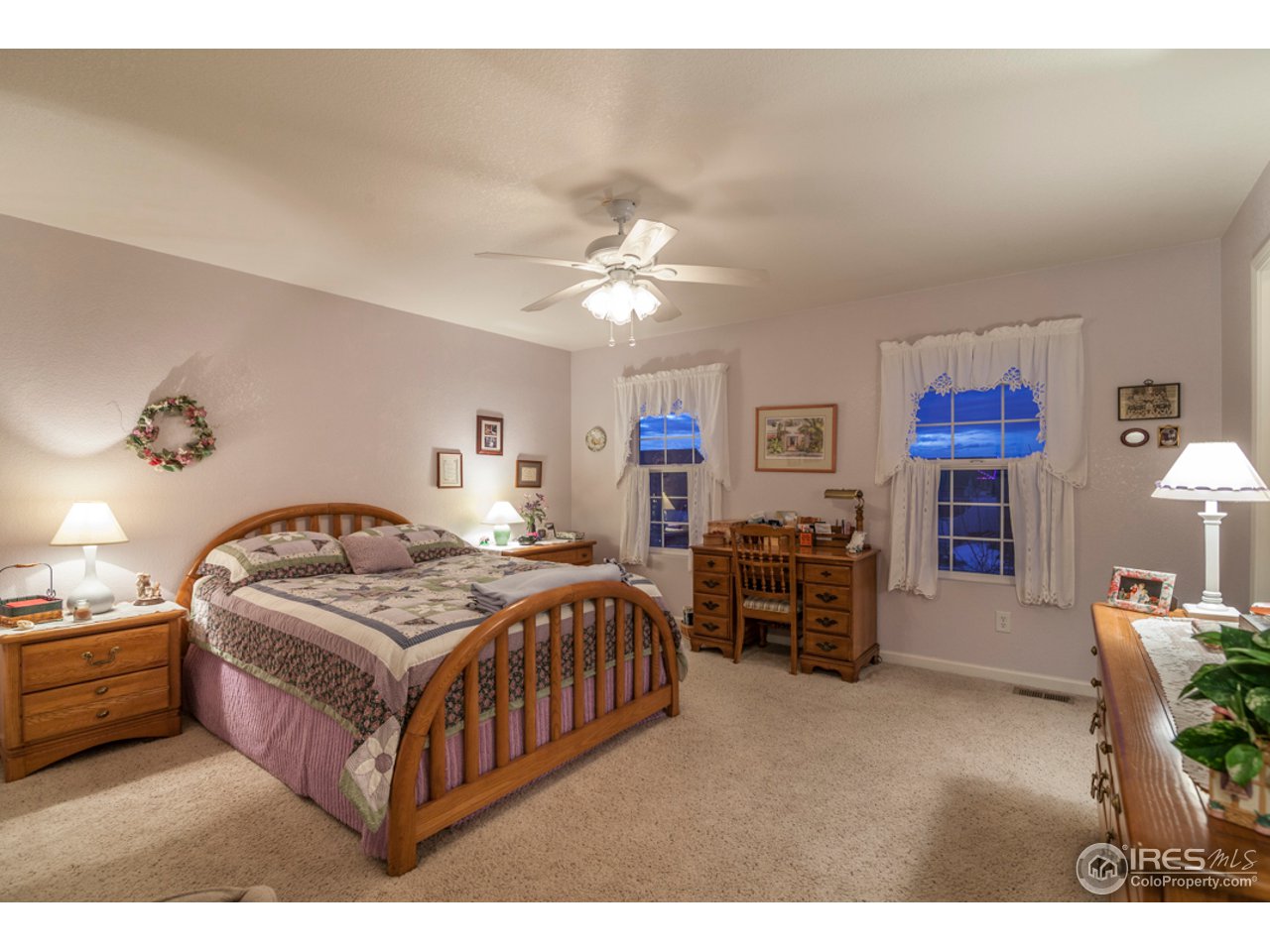 6948 McClellan Road Wellington, CO 80549 - Photo 10 of 36 and an expansive master bedroom