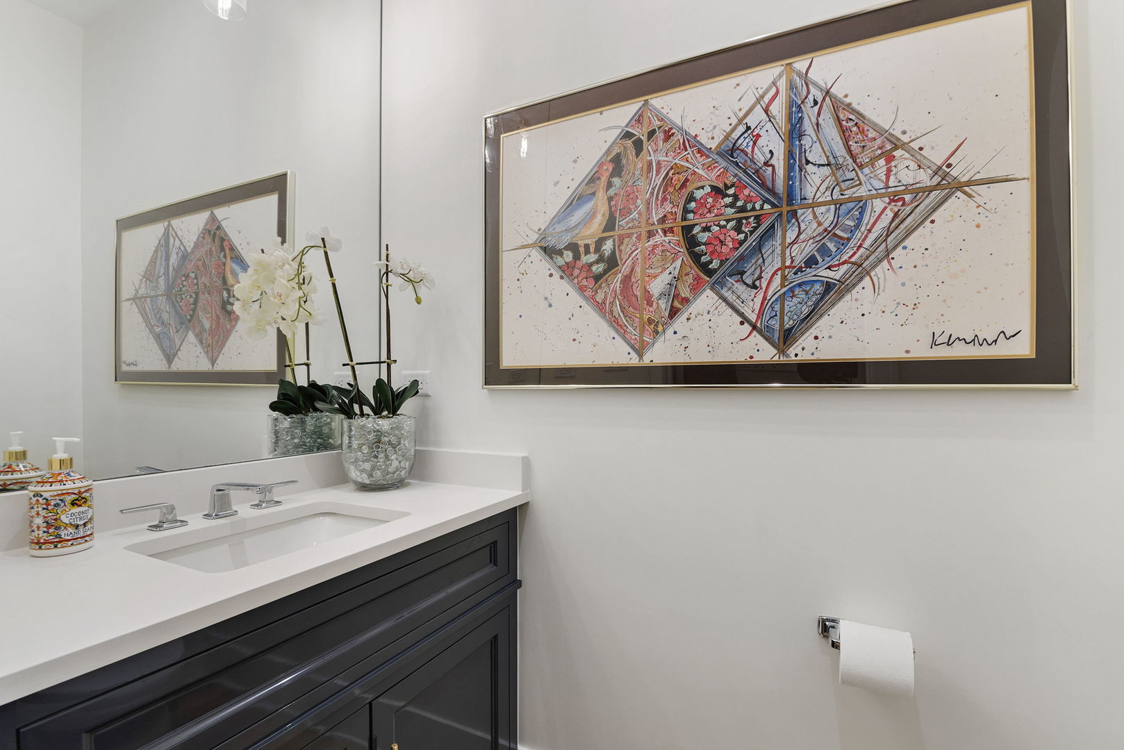 195 North Addison Avenue, Unit 303 Elmhurst, IL 60126 - Photo 12 of 30 a bathroom with a sink and a mirror