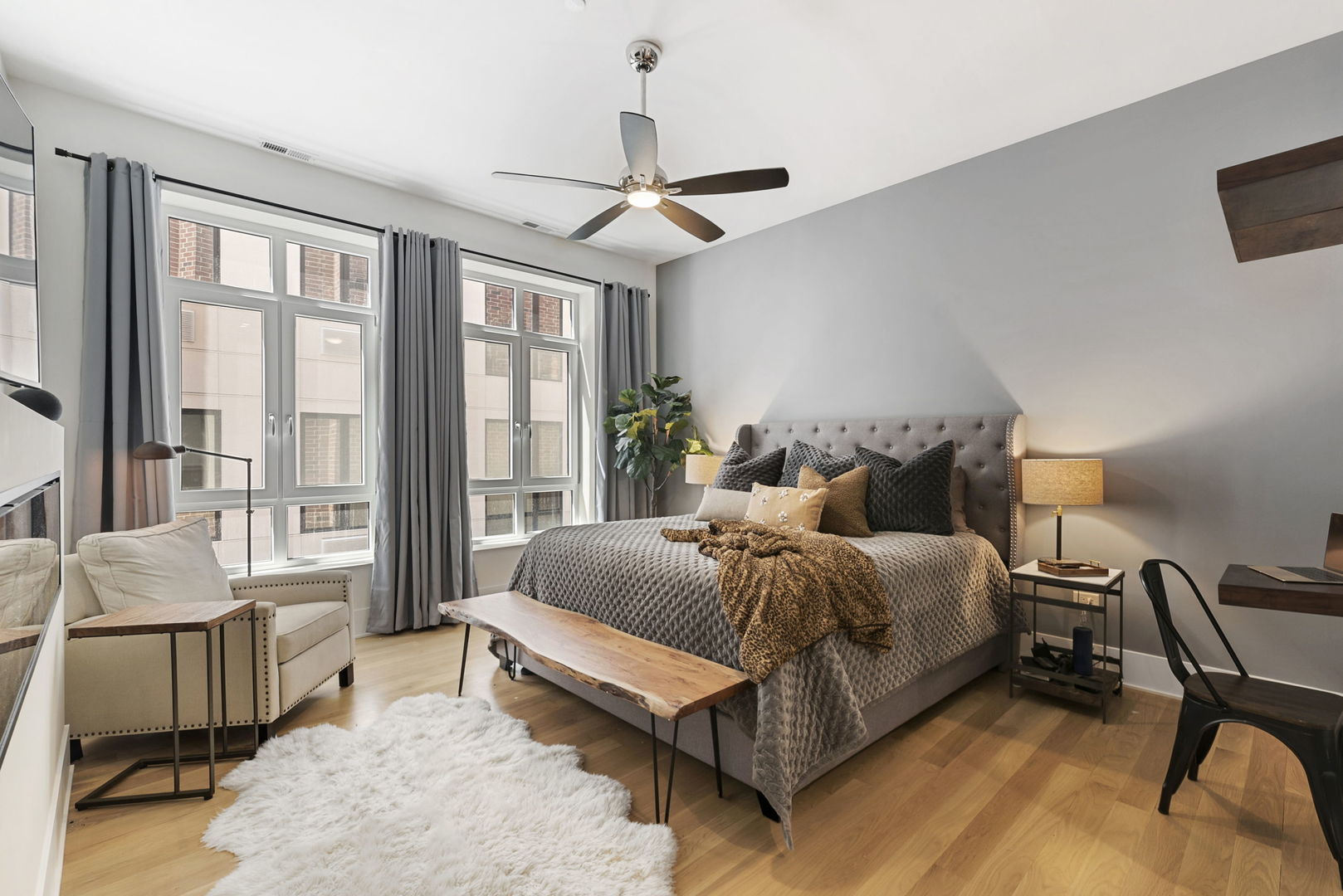 195 North Addison Avenue, Unit 303 Elmhurst, IL 60126 - Photo 13 of 30 a bed room with a bed and a chair
