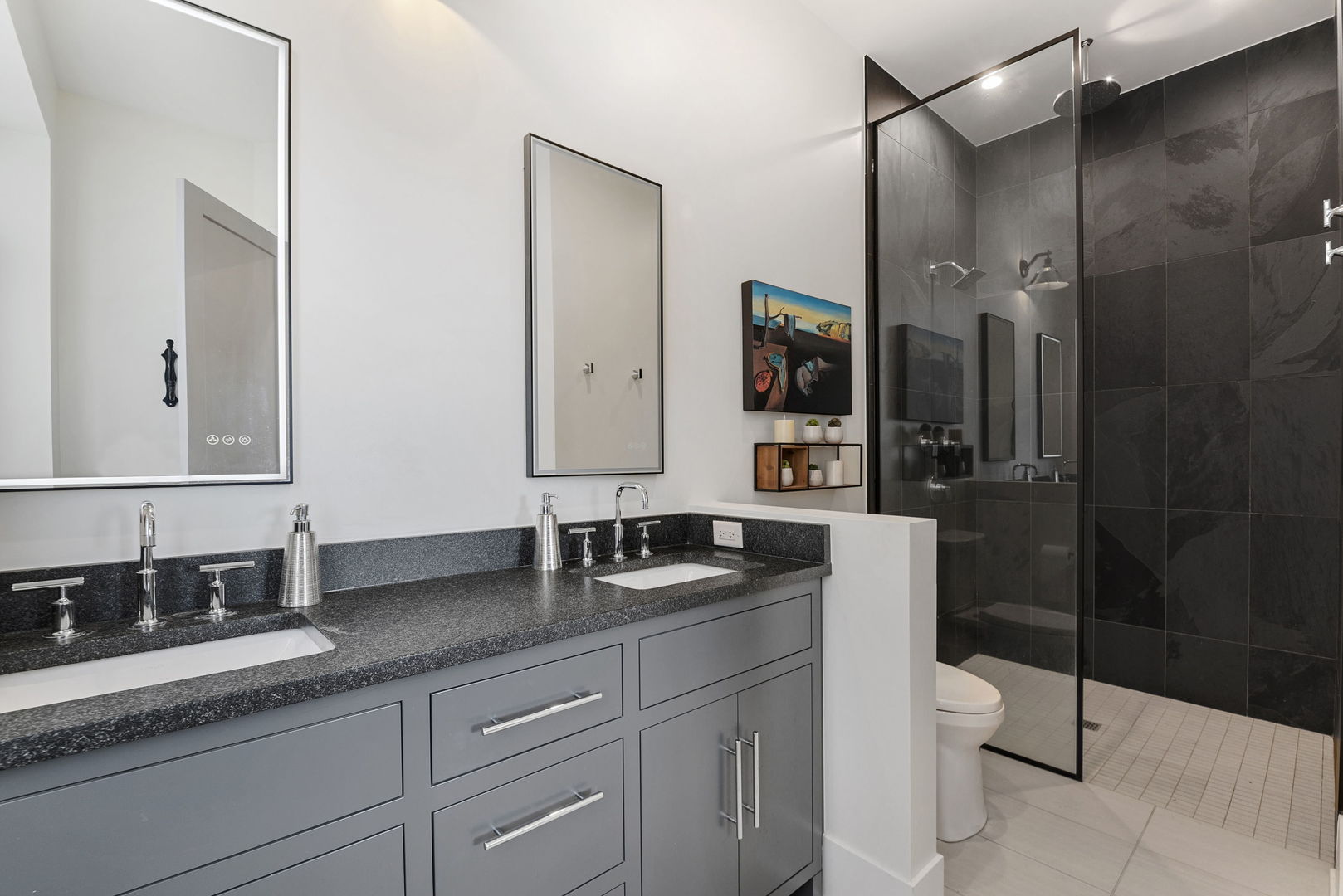 195 North Addison Avenue, Unit 303 Elmhurst, IL 60126 - Photo 20 of 30 a bathroom with a granite countertop sink a toilet a mirror and shower