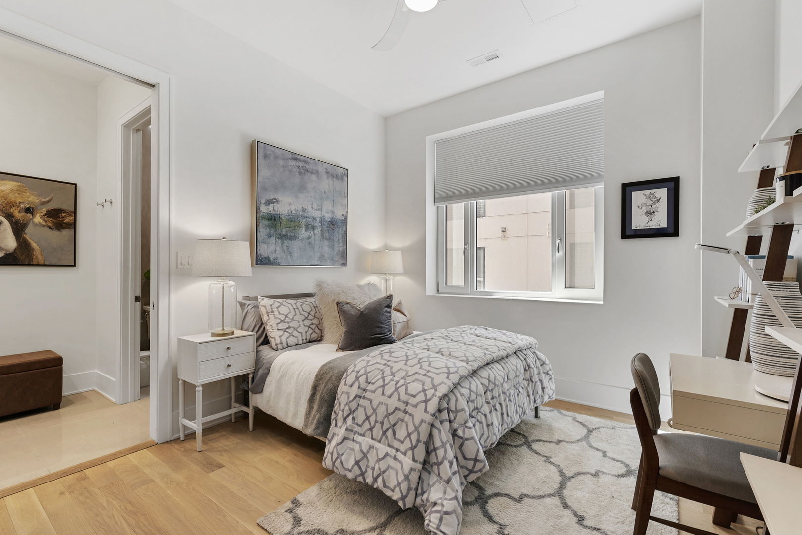 195 North Addison Avenue, Unit 303 Elmhurst, IL 60126 - Photo 21 of 30 a bedroom with a bed and a chair