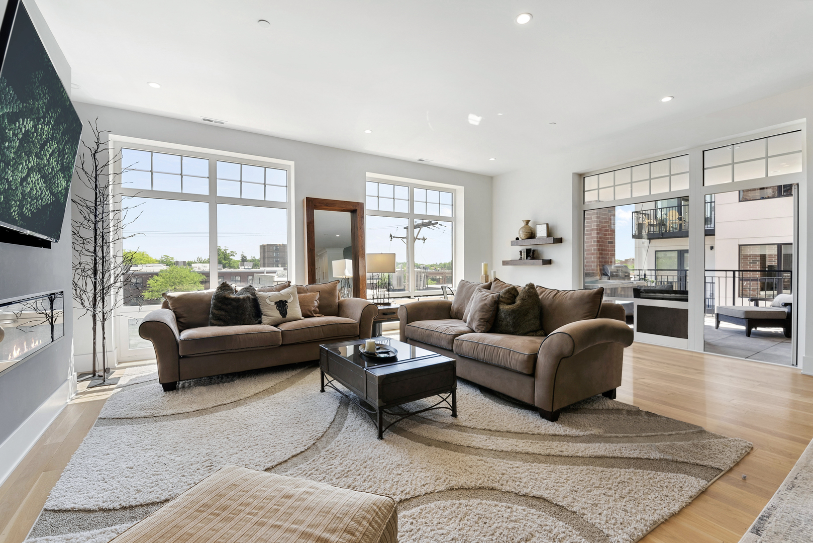 195 North Addison Avenue, Unit 303 Elmhurst, IL 60126 - Photo 7 of 30 a living room with furniture and a large window