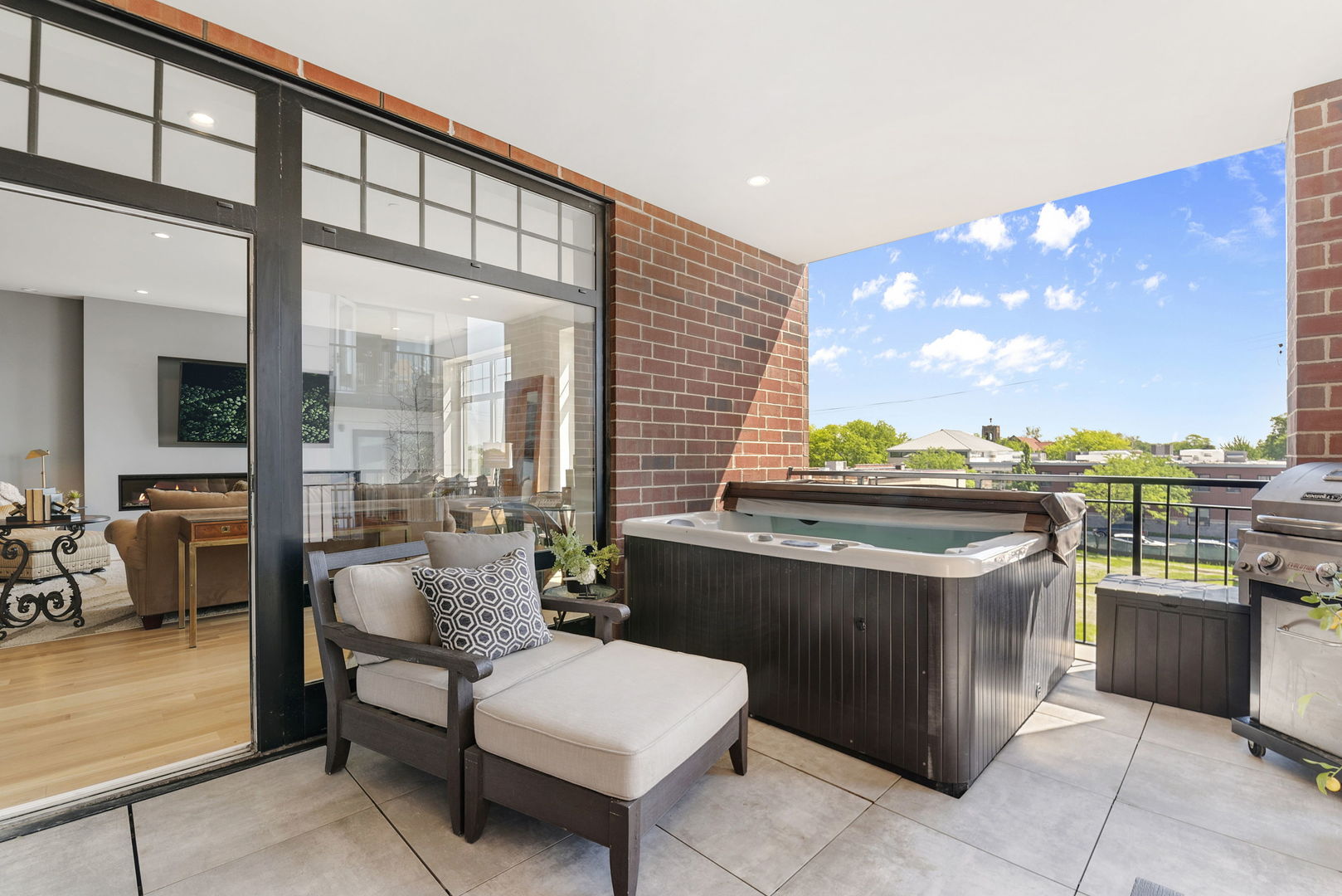 195 North Addison Avenue, Unit 303 Elmhurst, IL 60126 - Photo 8 of 30 a view of a chairs and table in a balcony