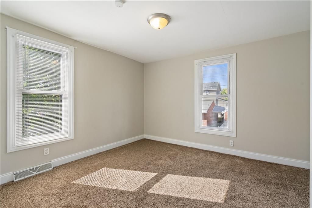 339 Brown Street Rochester, PA 15074 - Photo 16 of 17 a view of an empty room with a window
