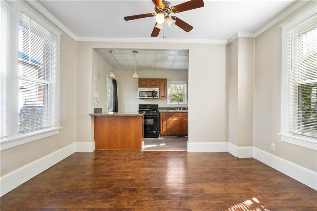 339 Brown Street Rochester, PA 15074 - Photo 5 of 17 a view of a living room and kitchen with a window