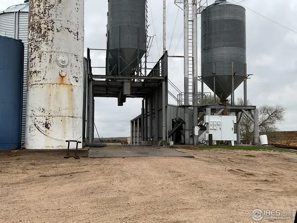 a view of a terrace with wooden fence