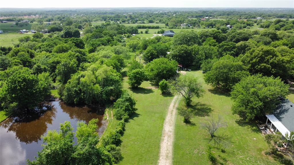 806 Old Base Road Aurora, TX 76078 - Photo 1 of 23 an aerial view of a house with a yard