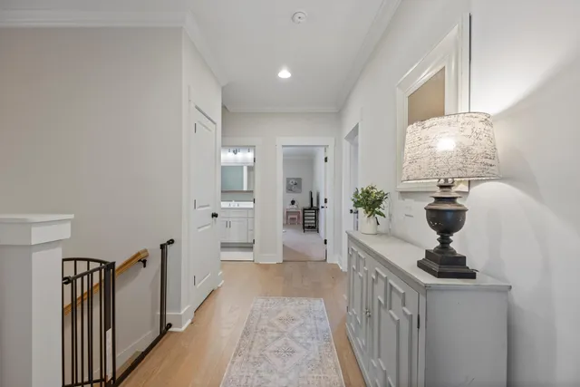 a spacious bedroom with a bed and a window