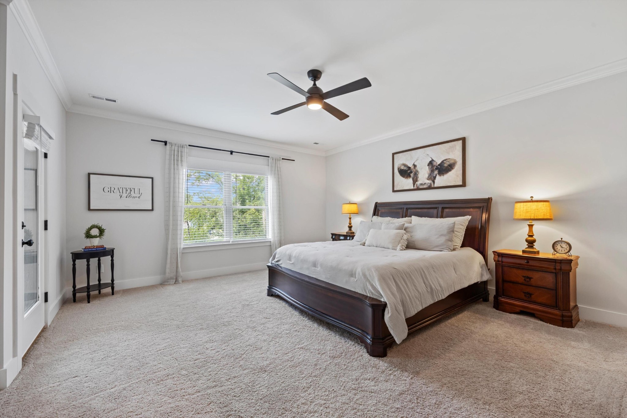 9638 Dutton Lane Ooltewah, TN 37363 - Photo 20 of 38 a spacious bedroom with a bed and a window