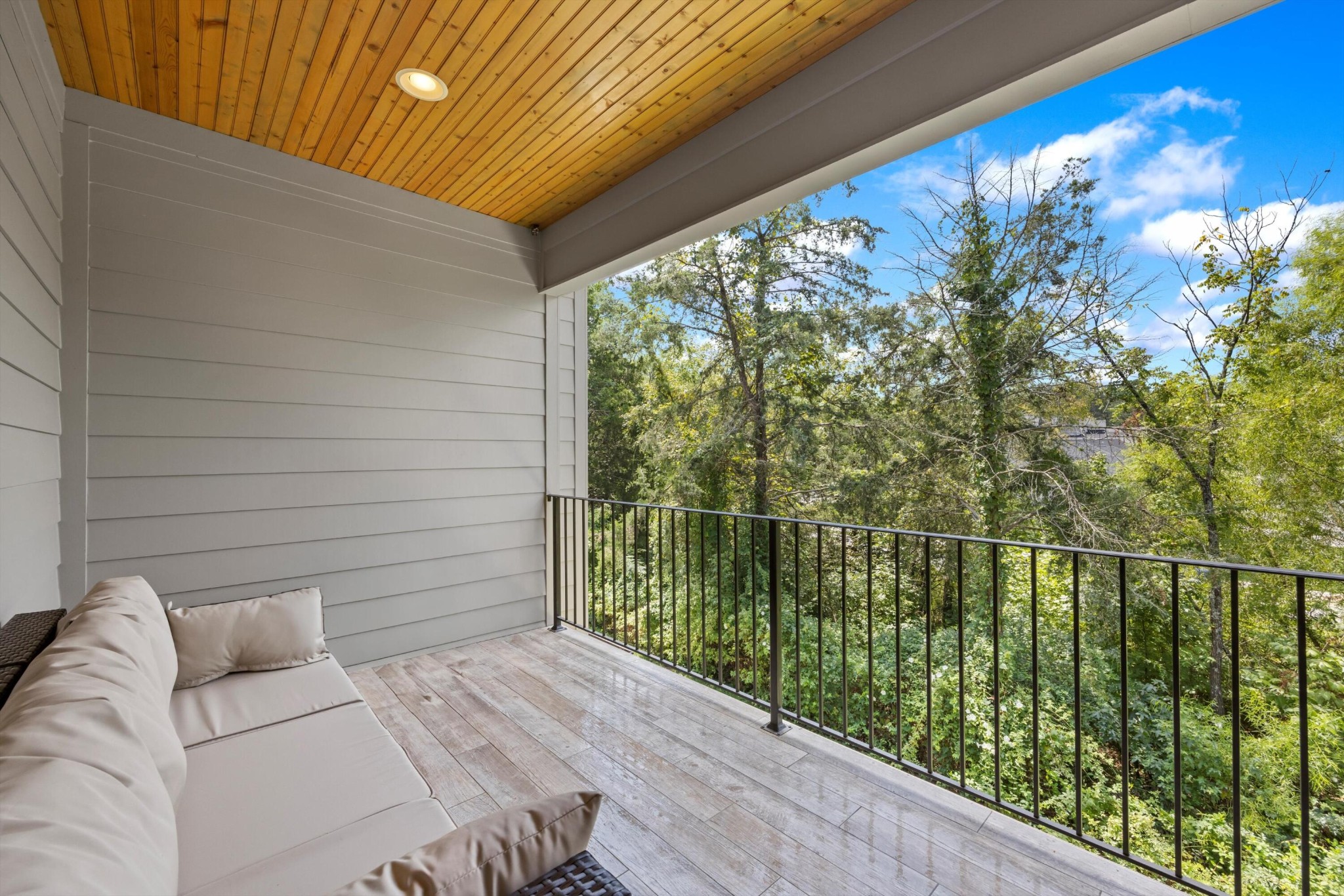9638 Dutton Lane Ooltewah, TN 37363 - Photo 24 of 38 a view of a balcony with floor to ceiling window and wooden floor