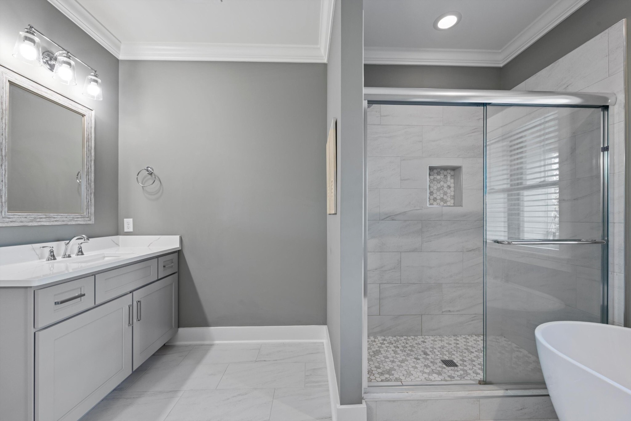 9638 Dutton Lane Ooltewah, TN 37363 - Photo 26 of 38 a bathroom with a double vanity sink toilet and shower