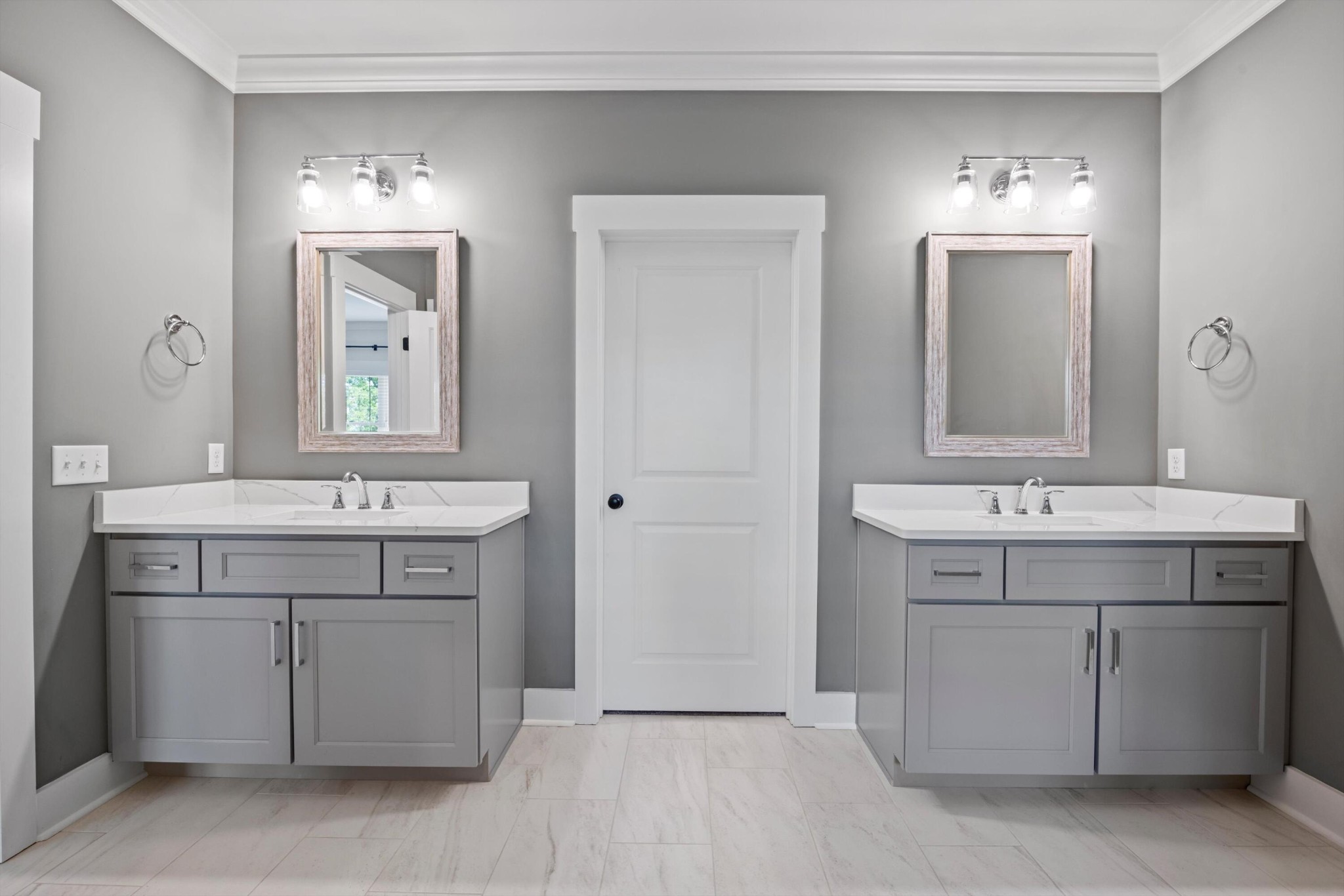 9638 Dutton Lane Ooltewah, TN 37363 - Photo 27 of 38 a bathroom with a sink and a mirror