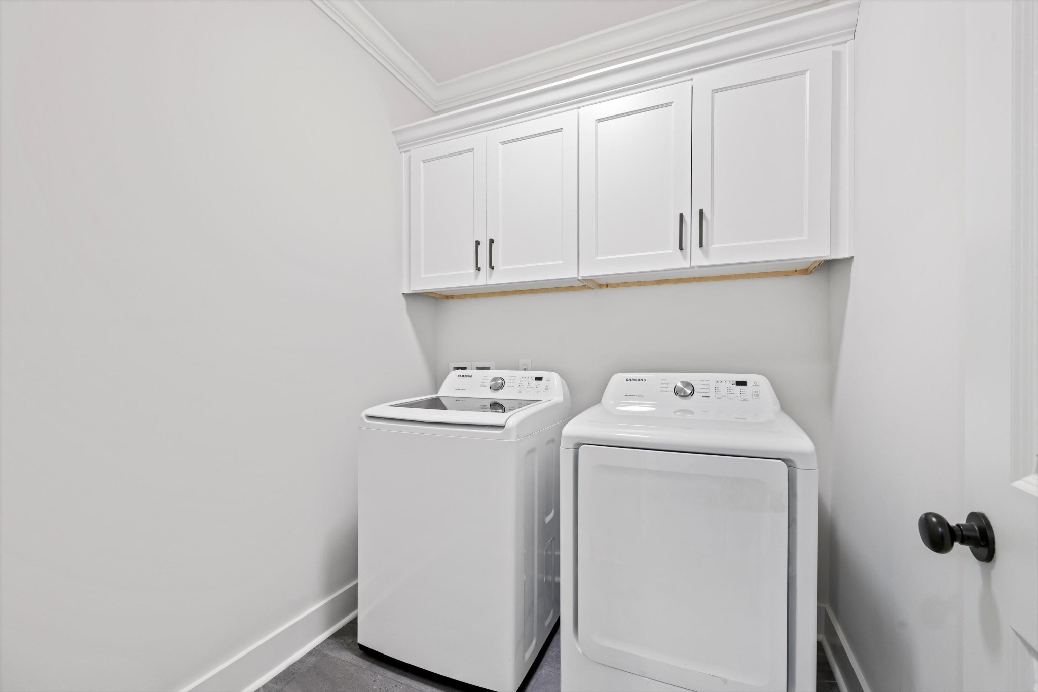 9638 Dutton Lane Ooltewah, TN 37363 - Photo 29 of 38 a utility room with dryer and washer