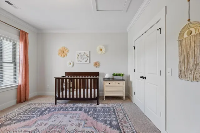 a view of a livingroom with furniture and hardwood floor