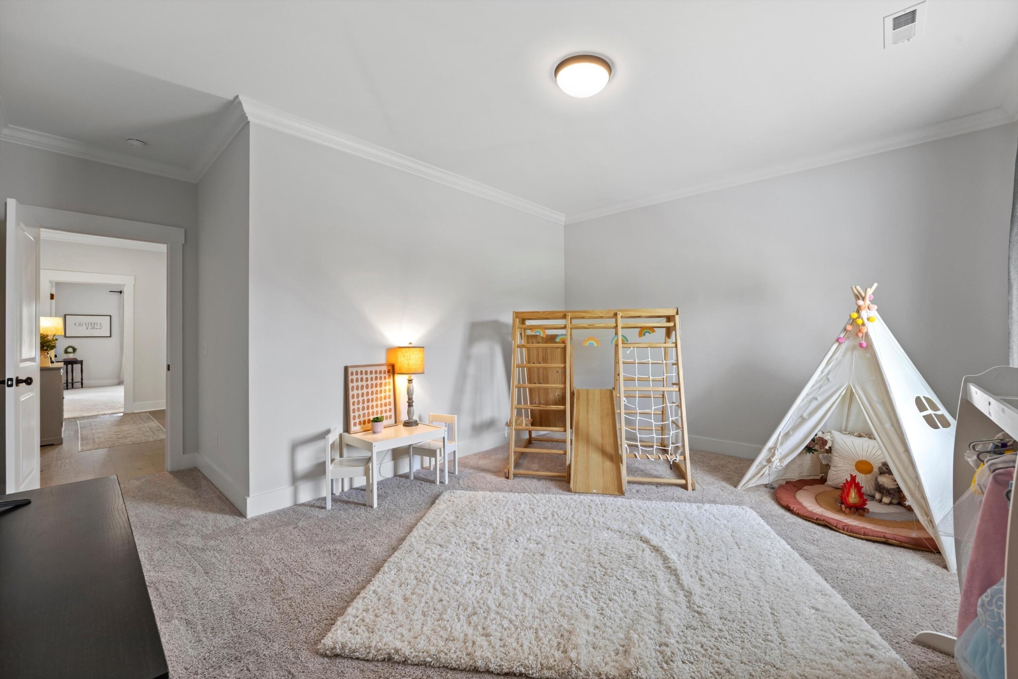 9638 Dutton Lane Ooltewah, TN 37363 - Photo 32 of 38 a view of a livingroom with furniture and hardwood floor