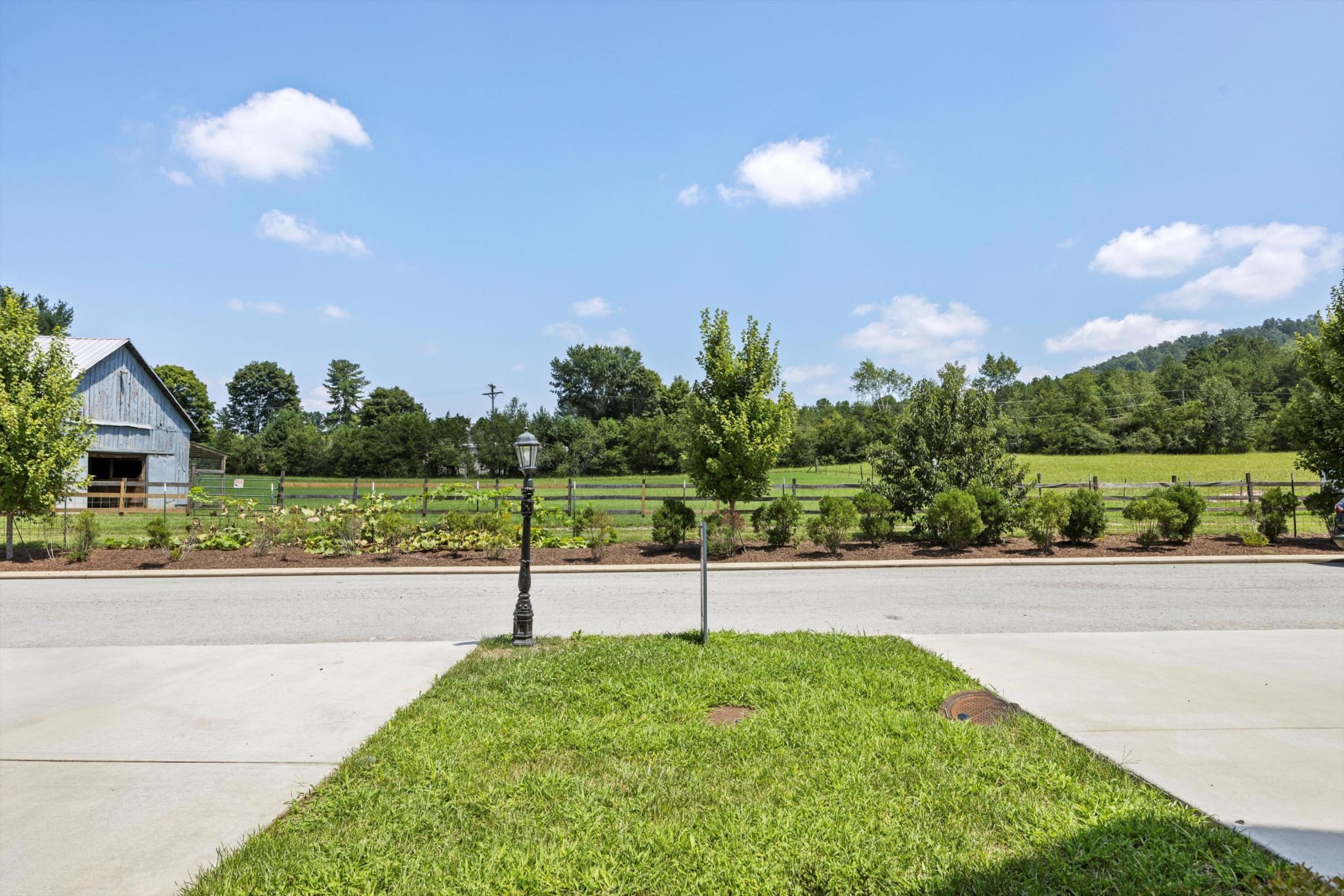 9638 Dutton Lane Ooltewah, TN 37363 - Photo 35 of 38 a view of a garden