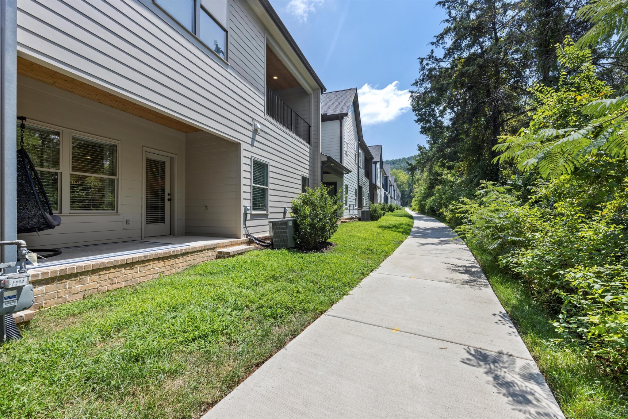 9638 Dutton Lane Ooltewah, TN 37363 - Photo 36 of 38 front view of a house with a yard