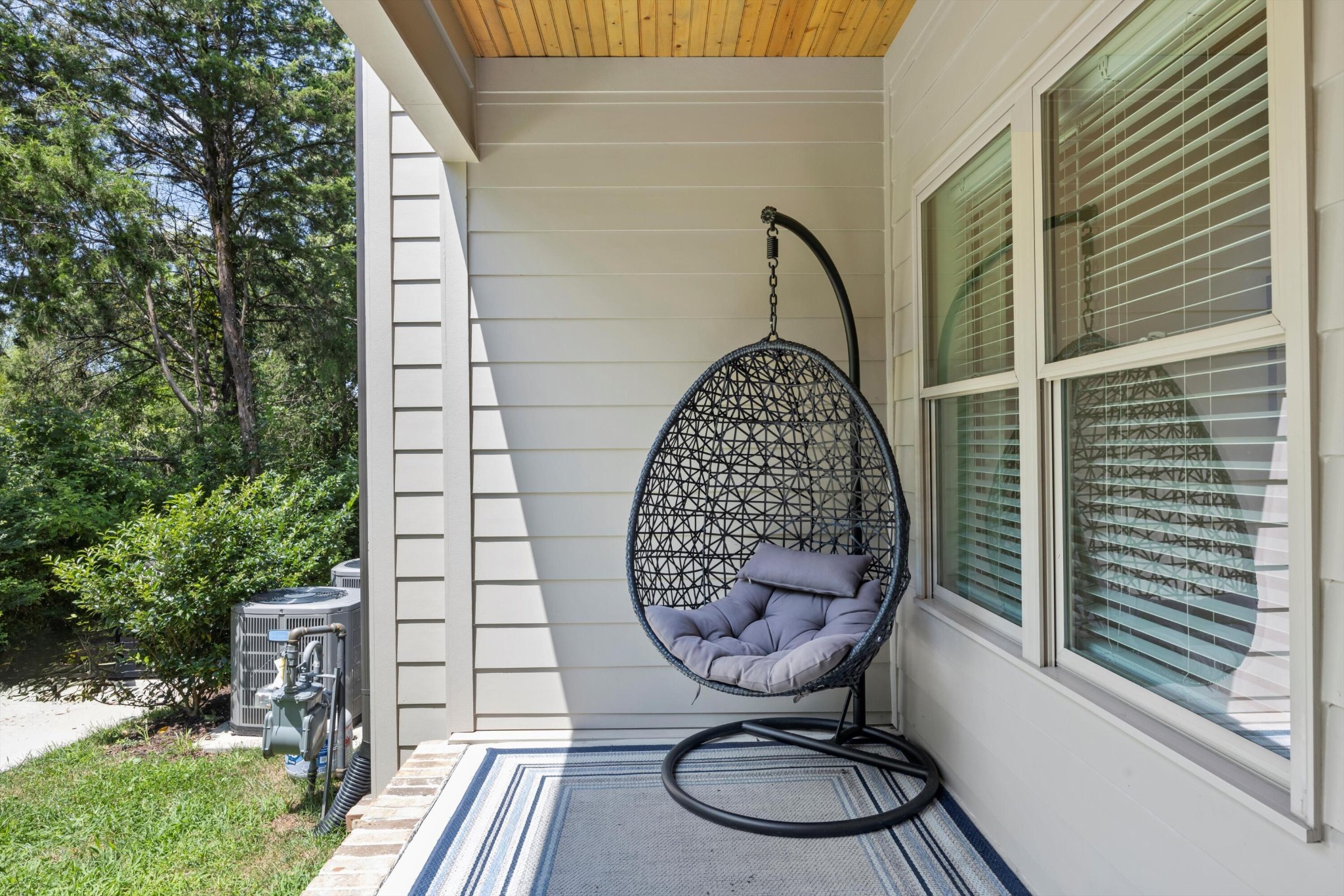 9638 Dutton Lane Ooltewah, TN 37363 - Photo 37 of 38 a view of a balcony with chairs and wooden floor