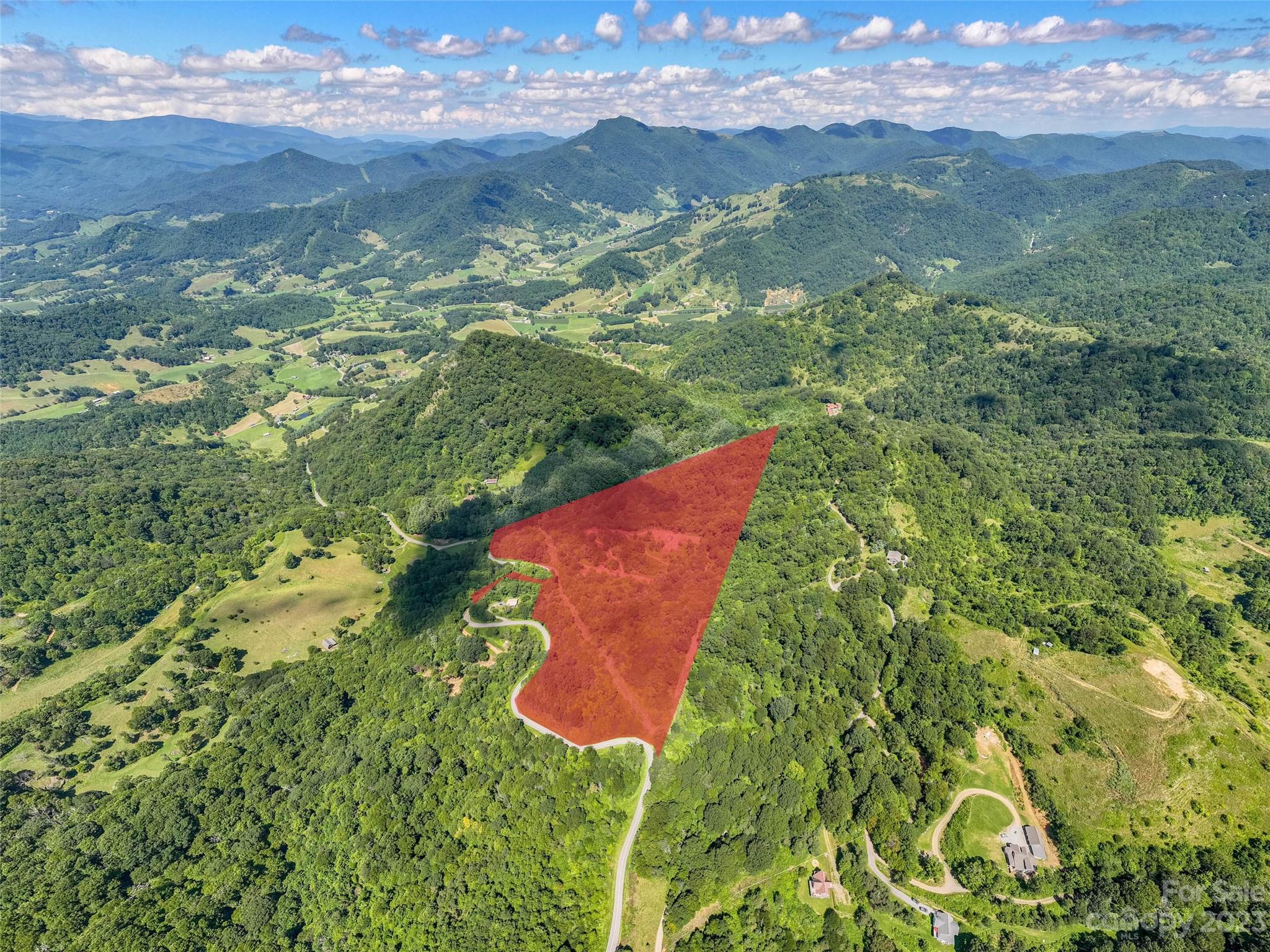 0 Crabtree Mountain Road Clyde, NC 28721 - Photo 20 of 23 a view of a lake with a mountain