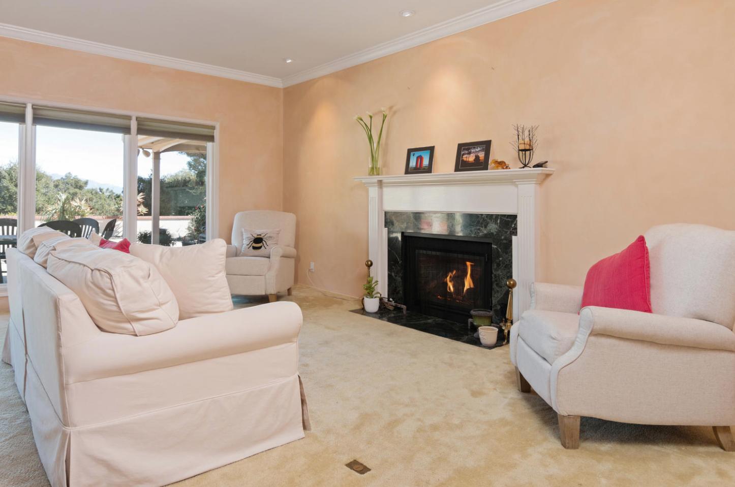 4460 Via Alegre Santa Barbara, CA 93110 - Photo 4 of 28 a living room with furniture and a fireplace