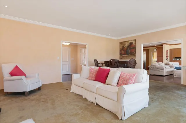 a living room with furniture and a couch