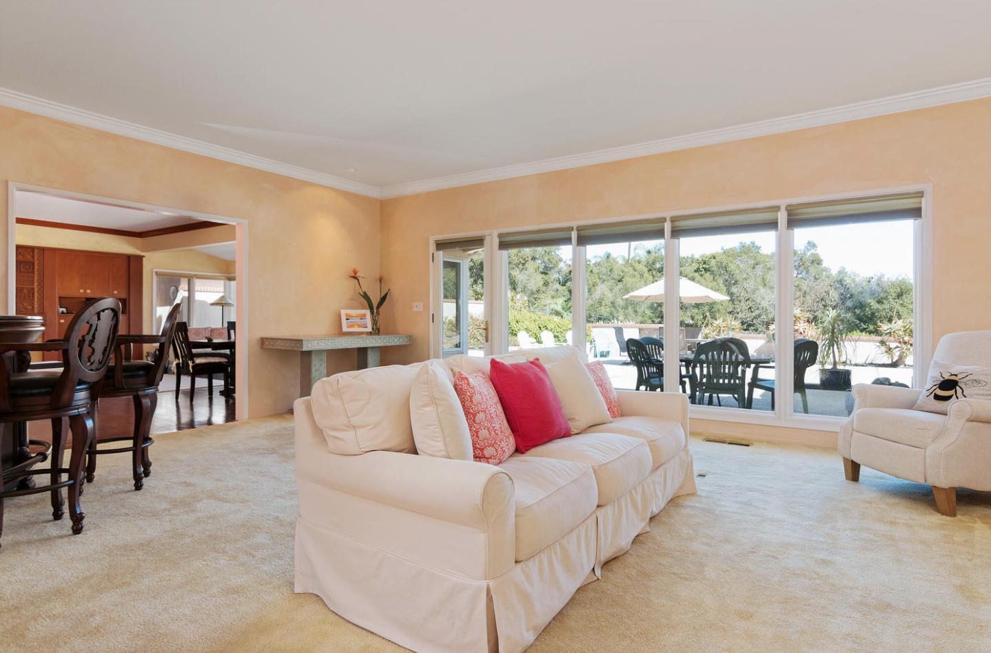 4460 Via Alegre Santa Barbara, CA 93110 - Photo 6 of 28 a living room with furniture and a large window