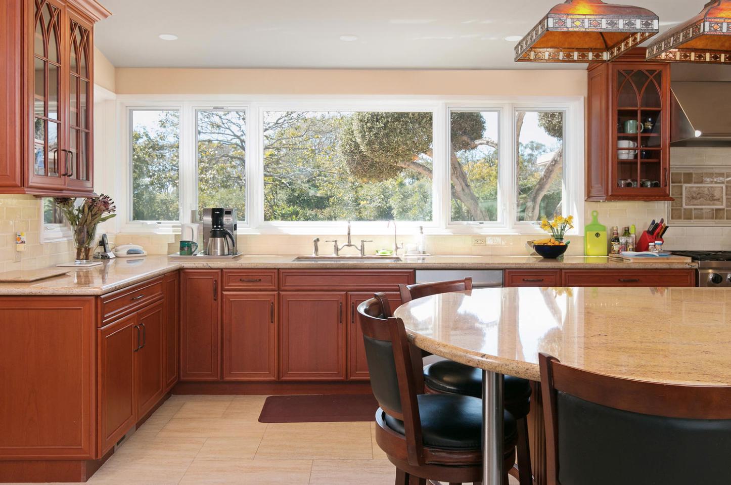 4460 Via Alegre Santa Barbara, CA 93110 - Photo 8 of 28 a dining table with chairs and window