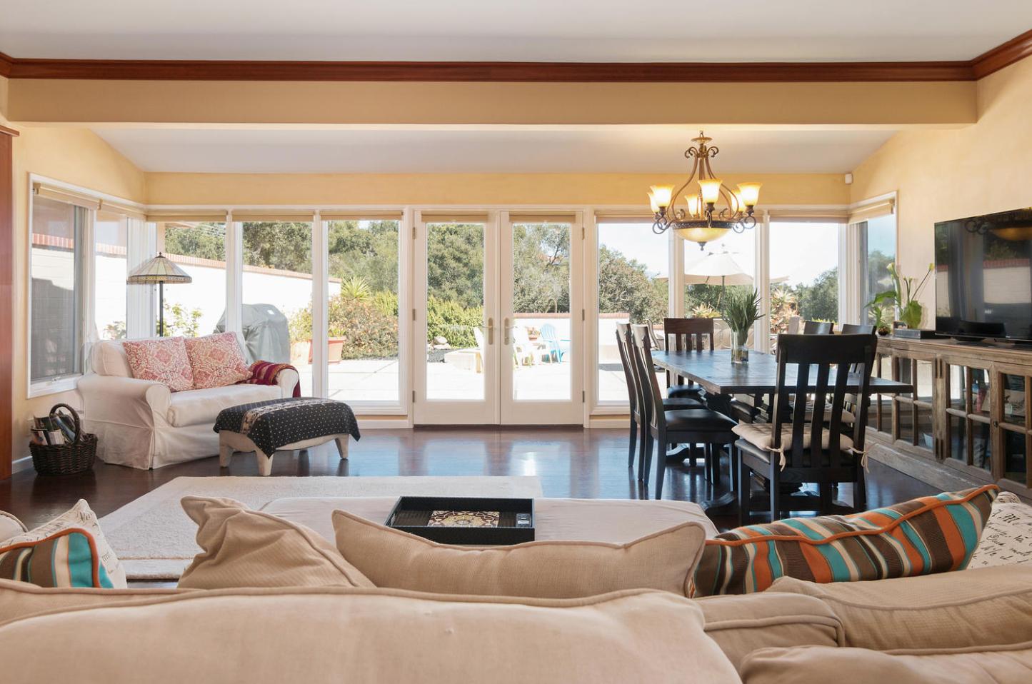 4460 Via Alegre Santa Barbara, CA 93110 - Photo 10 of 28 a living room with furniture and a large window
