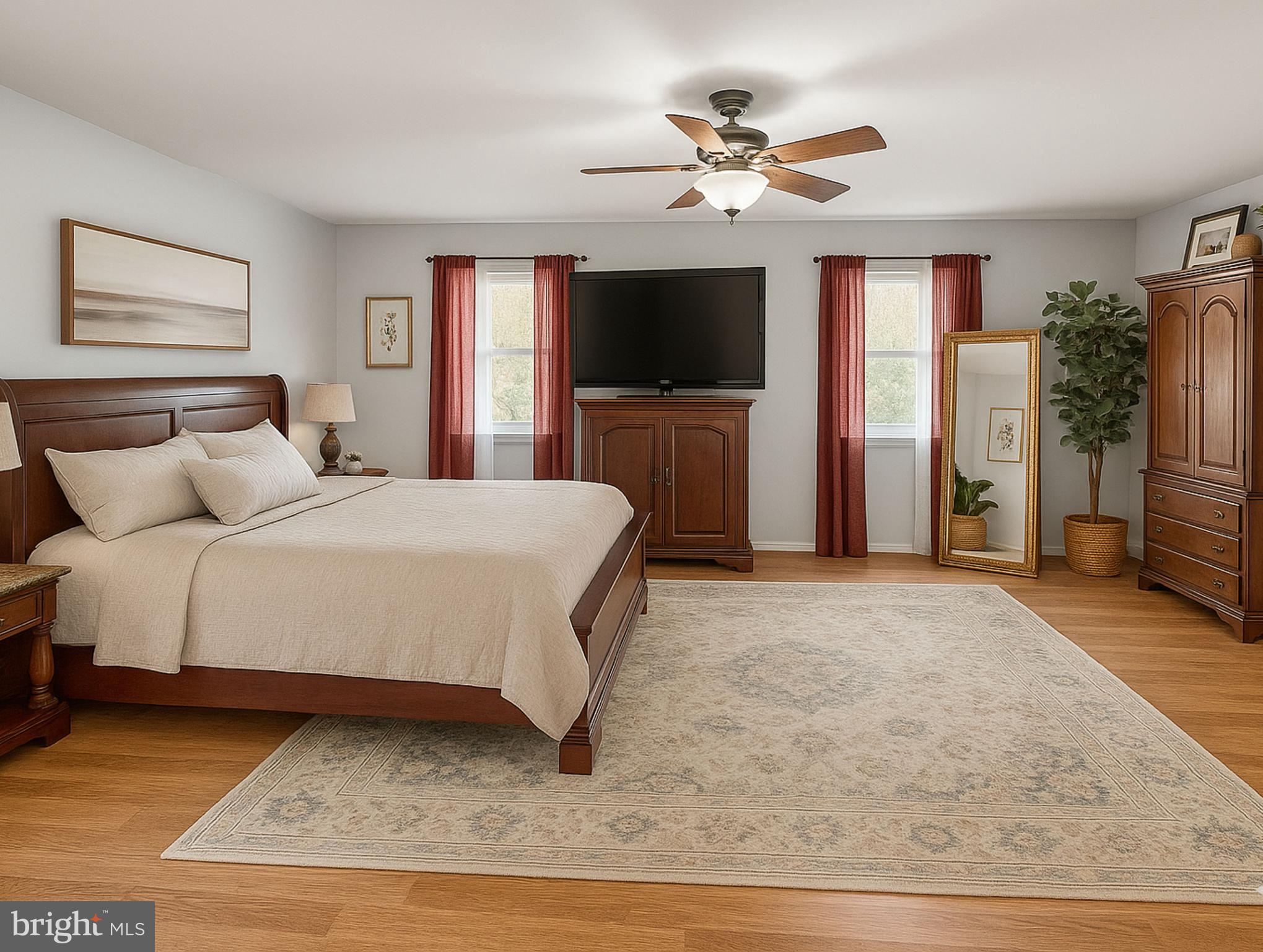 13200 Marsh Road Bealeton, VA 22712 - Photo 4 of 20 a spacious bedroom with a bed a window and a television