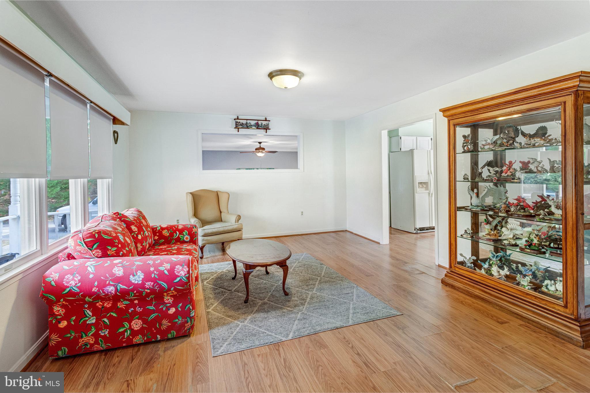 13200 Marsh Road Bealeton, VA 22712 - Photo 6 of 20 a living room with furniture and a large window