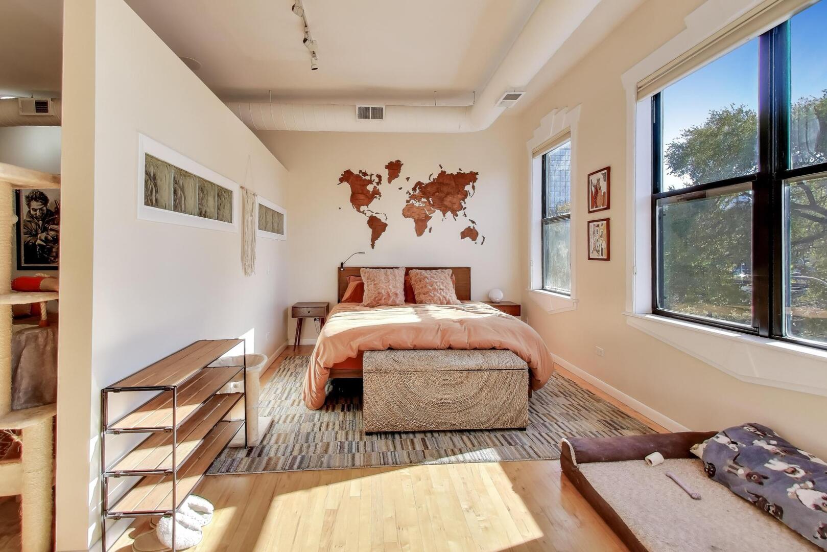 400 North Racine Avenue, Unit 204 Chicago, IL 60642 - Photo 19 of 28 a bedroom with a bed and a window