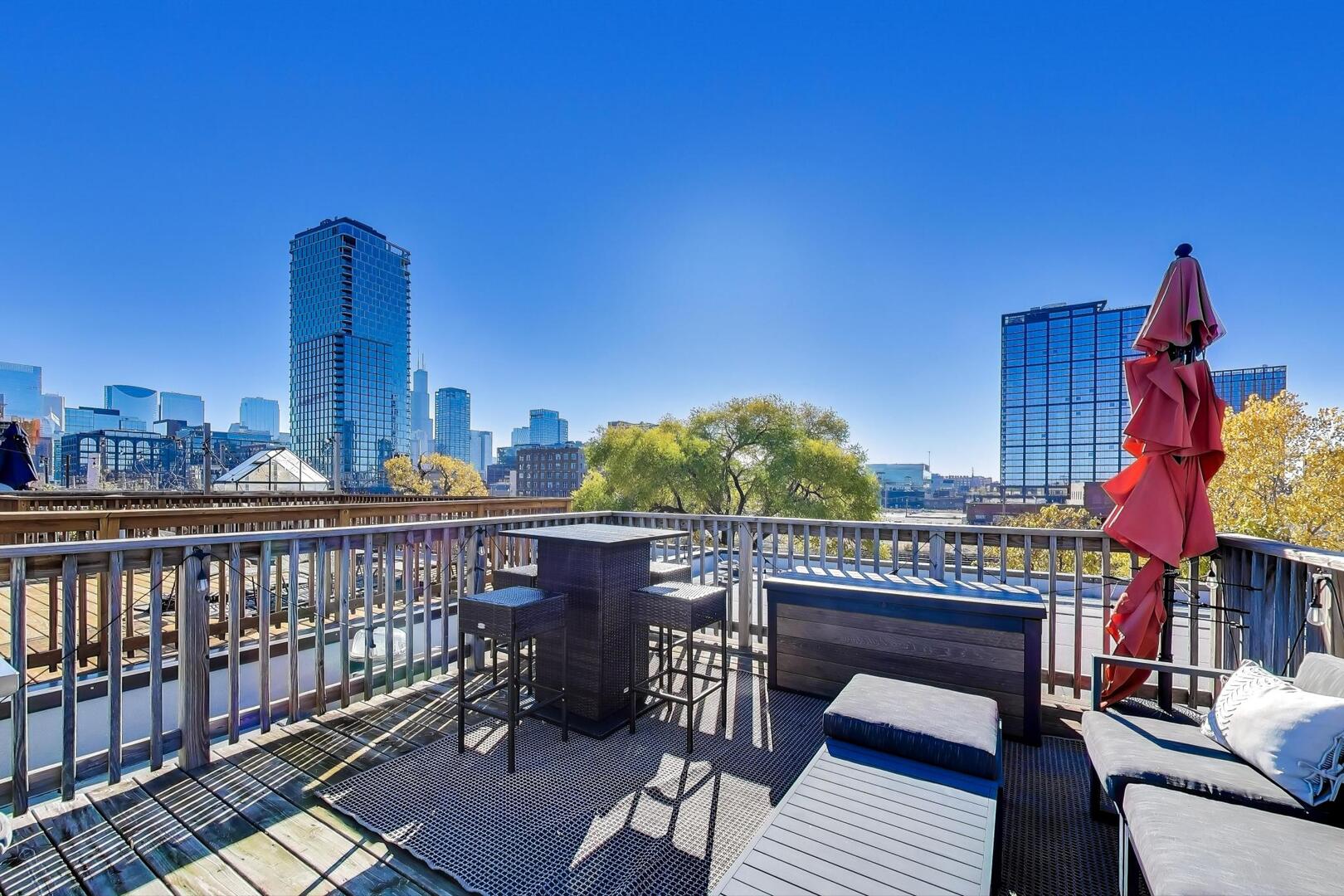 400 North Racine Avenue, Unit 204 Chicago, IL 60642 - Photo 25 of 28 a view of a balcony with furniture