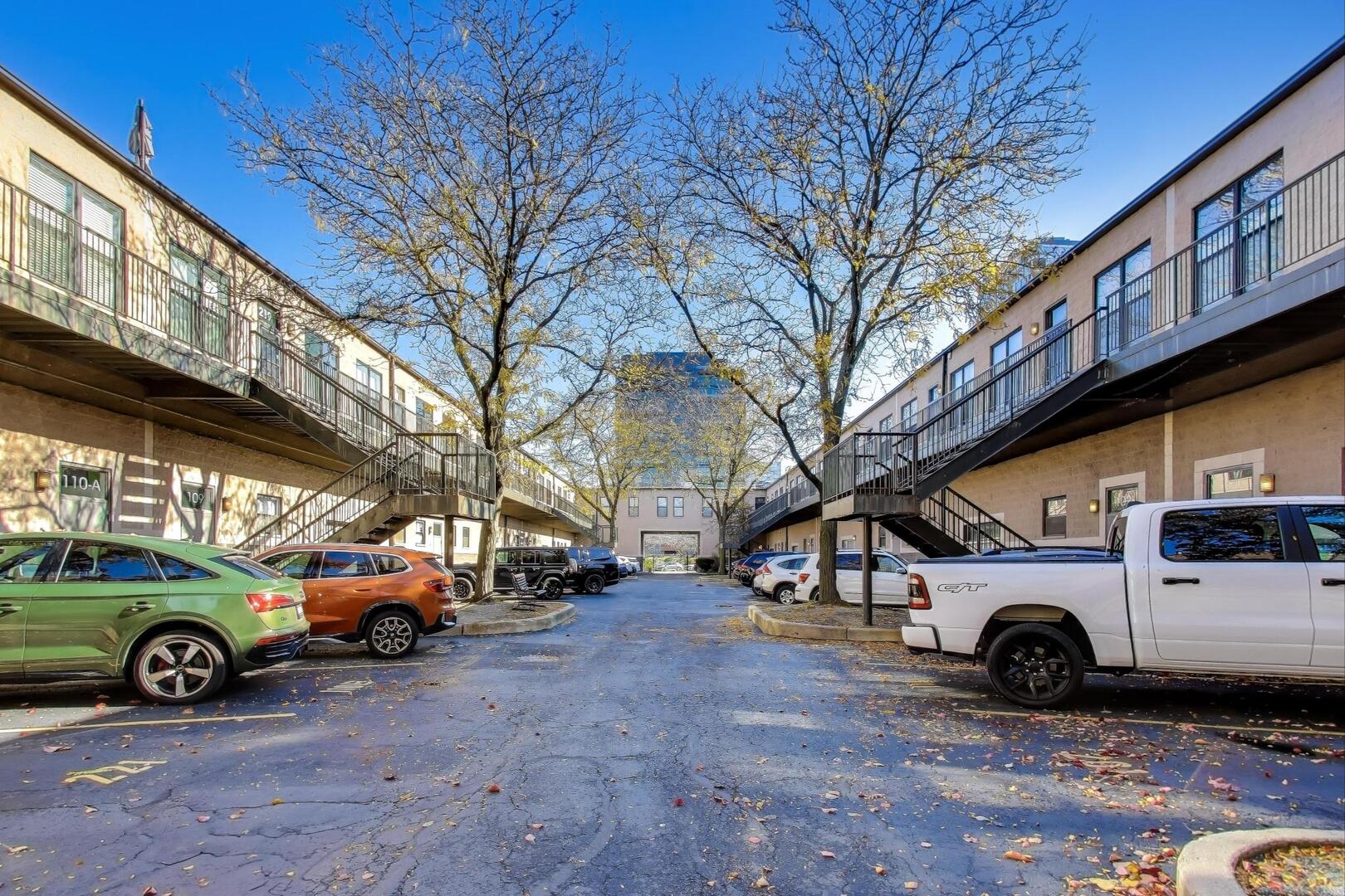 400 North Racine Avenue, Unit 204 Chicago, IL 60642 - Photo 6 of 28 a view of car parking