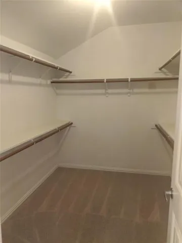 a view of small space with racks on the wall