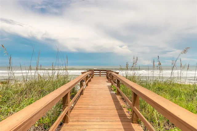 a view of swimming pool with a lake