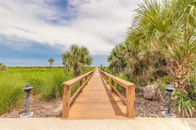 a view of swimming pool with seating area