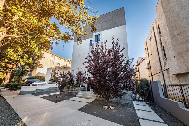 a view of a street with houses