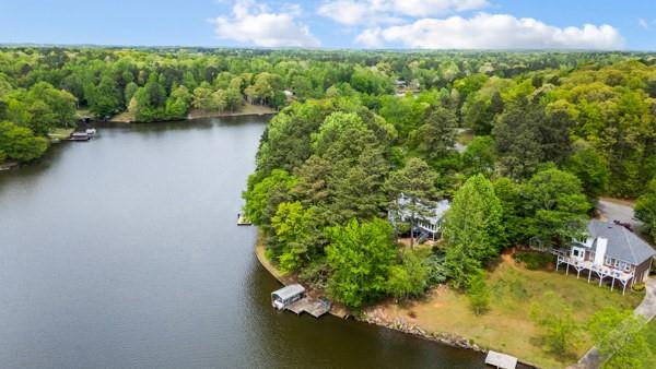 167 Edgewater Drive Temple, GA 30179 - Photo 34 of 37 a view of a garden with a lake