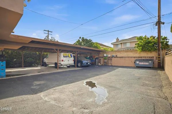 a view of car parked in front of house
