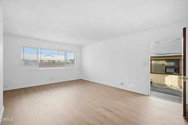 a view of an empty room and window
