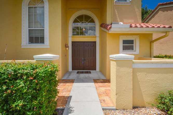 10009 Country Brook Road Boca Raton, FL 33428 - Photo 38 of 38 Front