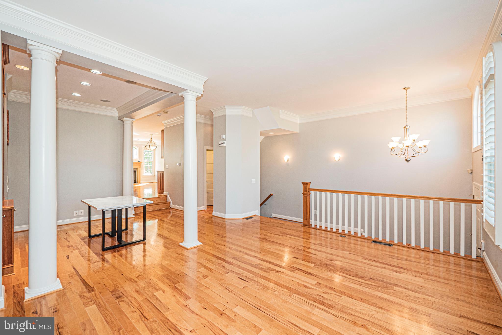 5448 Edsall Ridge Place Alexandria, VA 22312 - Photo 5 of 52 a view of a livingroom with furniture and wooden floor