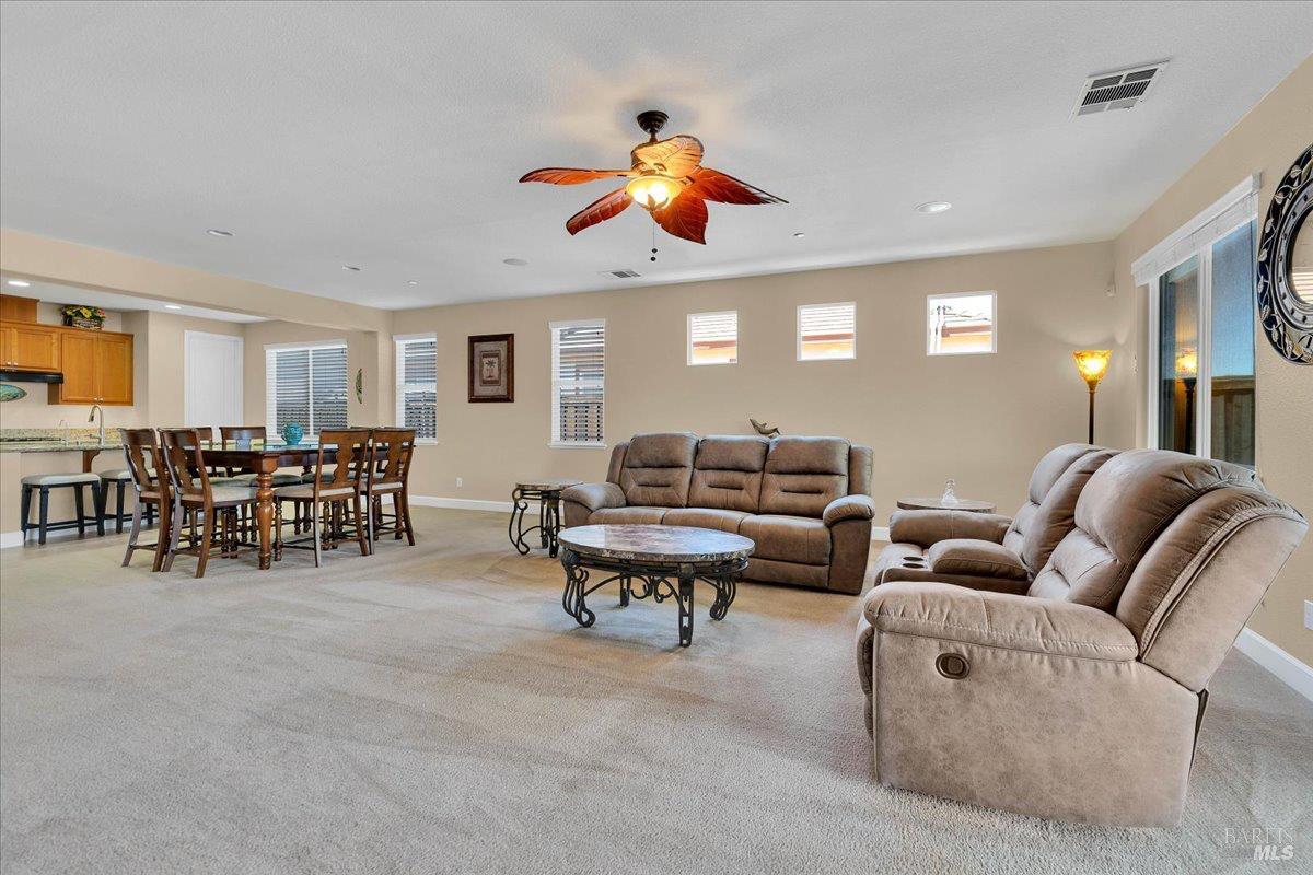 331 Frisbie Circle Vacaville, CA 95688 - Photo 11 of 93 Seamless Open-Concept Living here where the Family Room, Dining & Kitchen come together beautifully!
