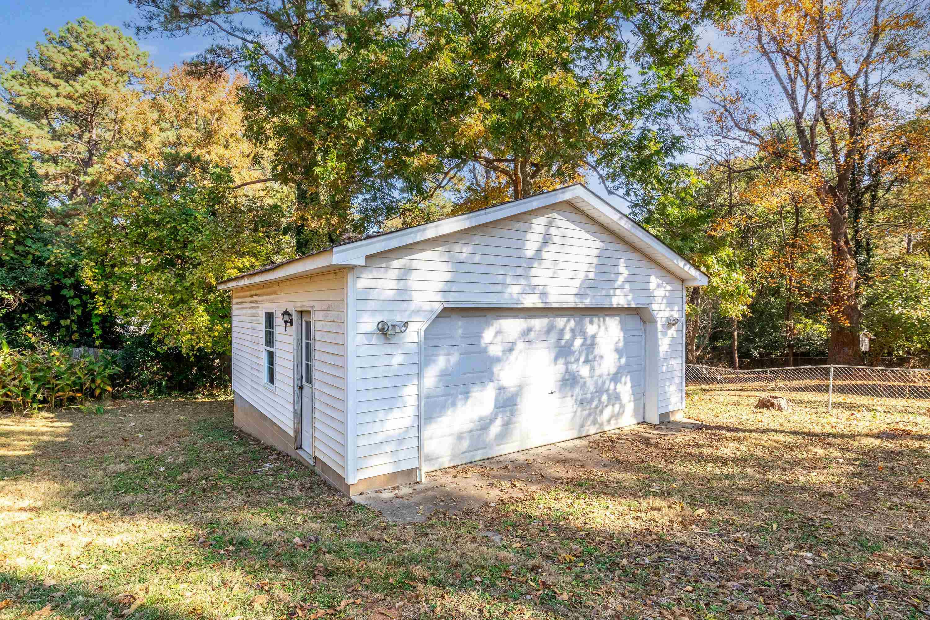 1111 Southerlund Road Garner, NC 27529 - Photo 29 of 29 a view of a house with backyard and trees