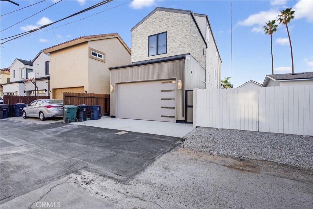 520 11th Street Huntington Beach, CA 92648 - Photo 23 of 65 a view of car parked in front of house