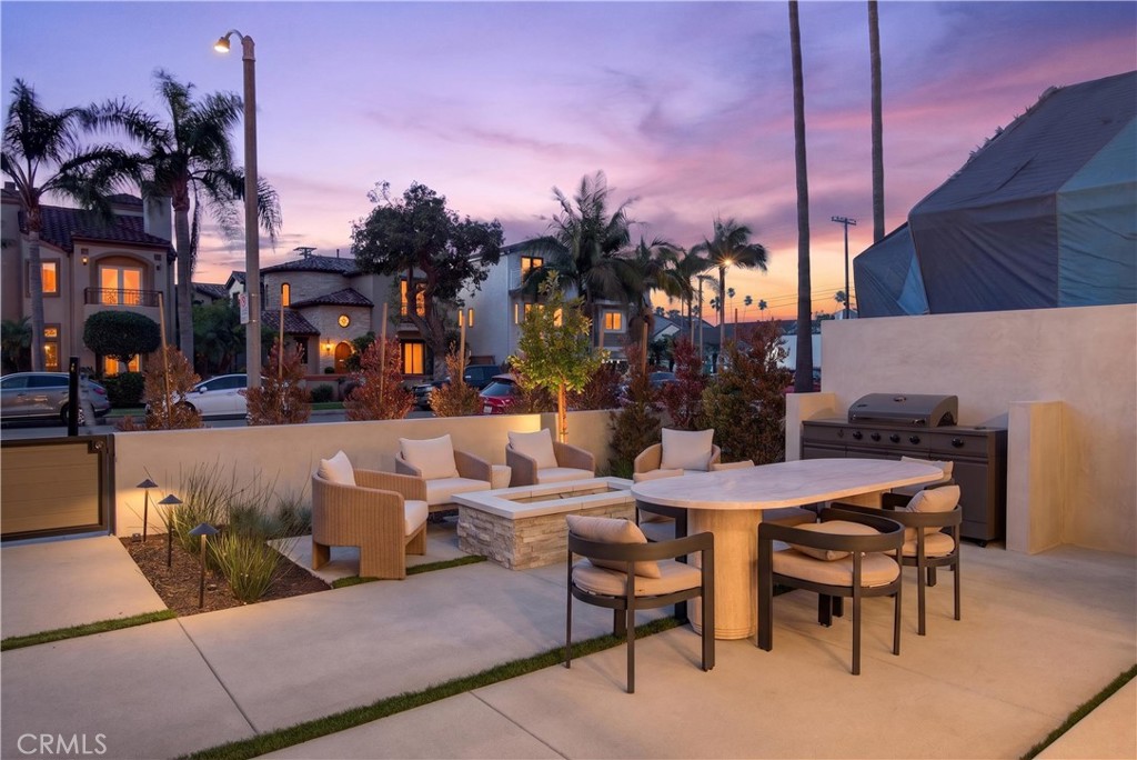 520 11th Street Huntington Beach, CA 92648 - Photo 61 of 65 a view of a patio with iron fence