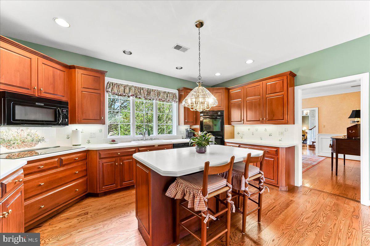 7 Bolingbroke Road West Chester, PA 19382 - Photo 24 of 86 Warm wood tones in a spacious kitchen.