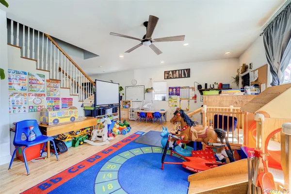 a play room with lots of furniture