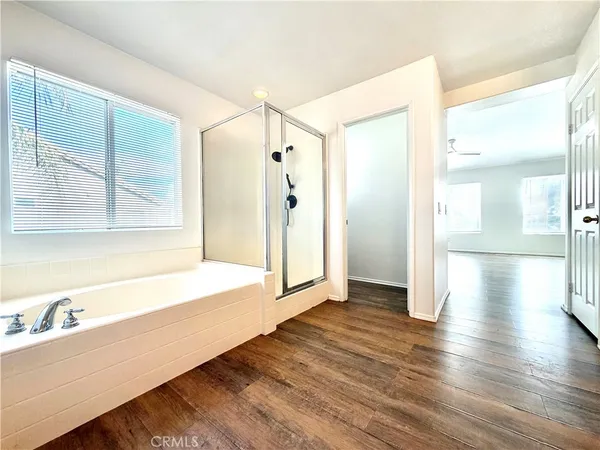 a bathroom with a bathtub and a sink